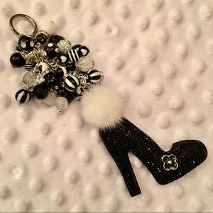 SPARKLY BLACK HI-HEEL WITH DANGLES & POM!